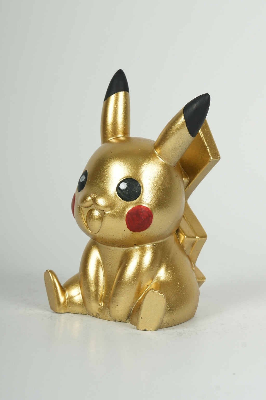 Golden Electric Mouse Statue – Cute Anime Creature Collectible