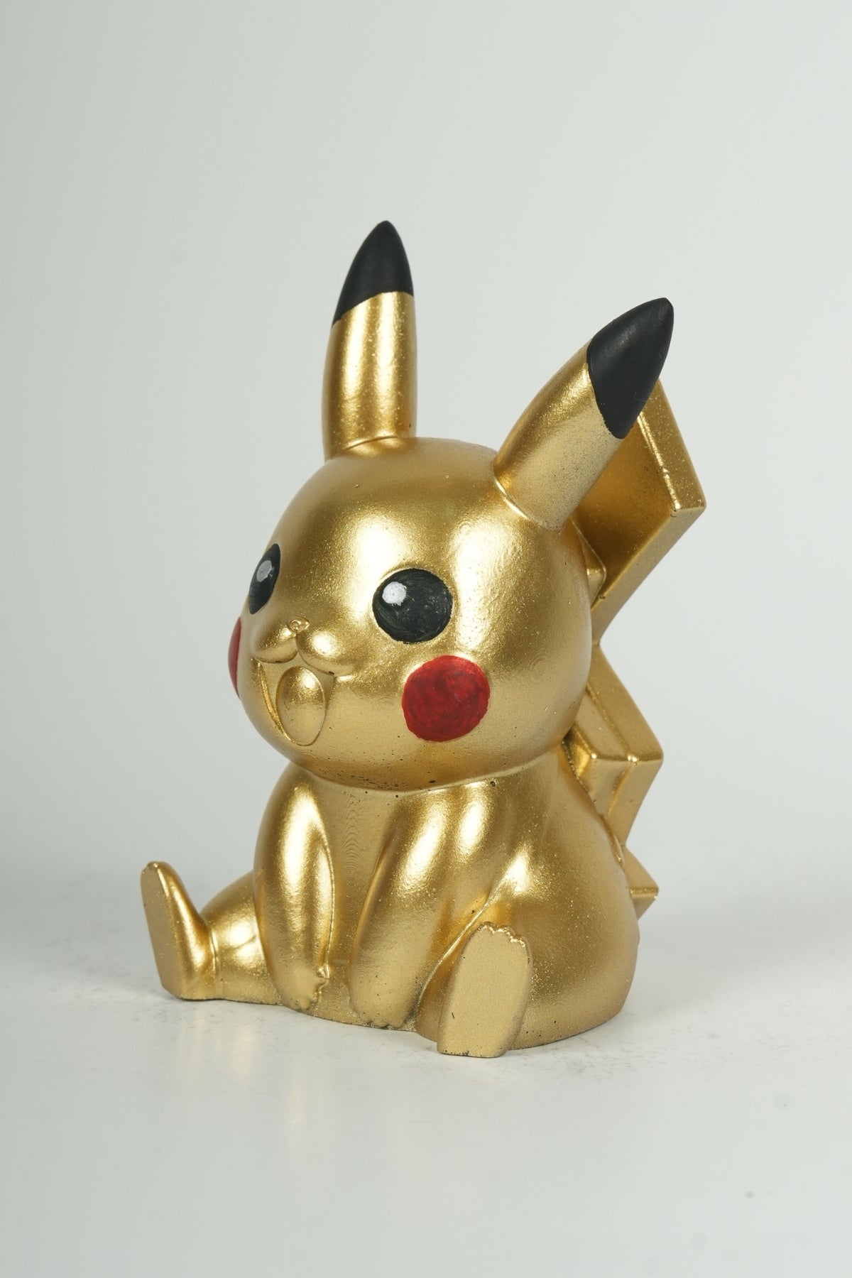Golden Electric Mouse Statue – Cute Anime Creature Collectible